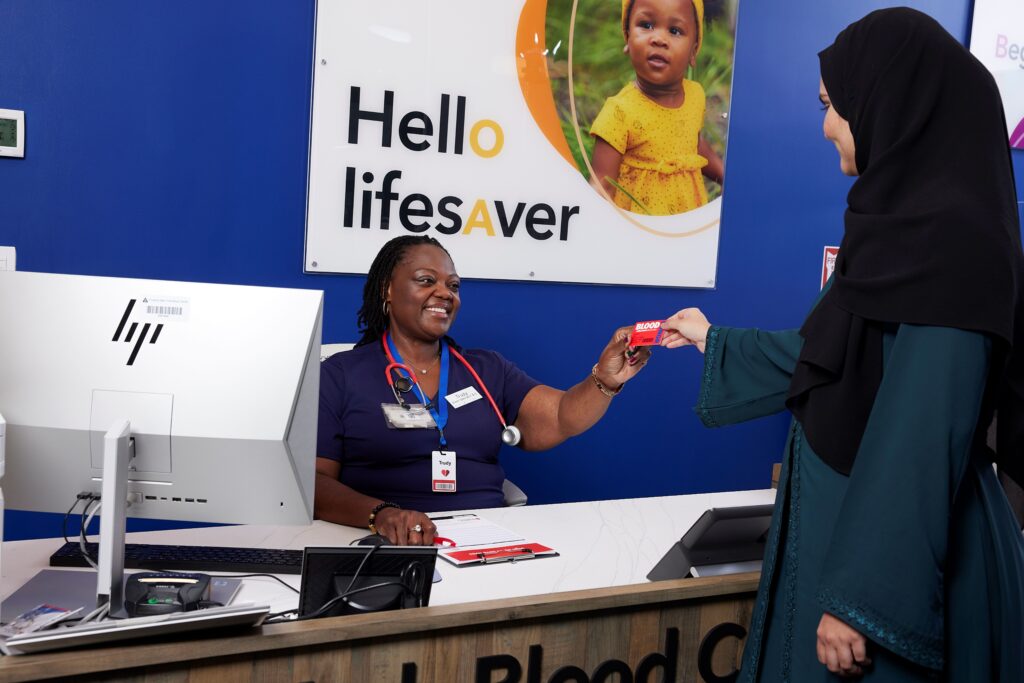 Blood donor registering to make blood donation at NYBC donation center