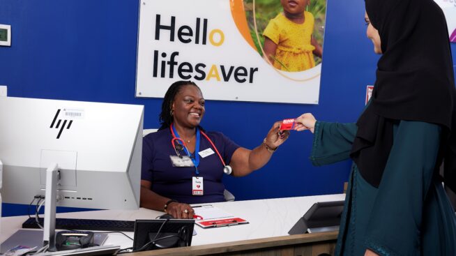 Blood donor registering to make blood donation at NYBC donation center